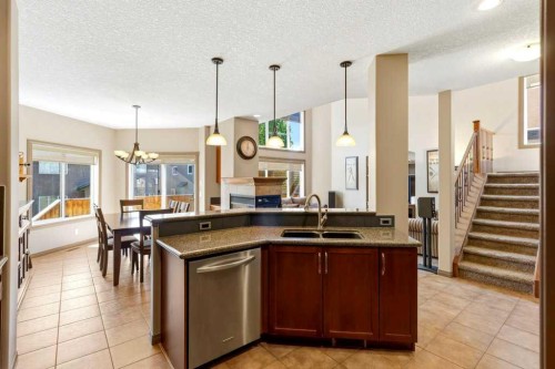 23 Aspen Stone Crescent Sw, Calgary, AB - Indoor Photo Showing Kitchen With Double Sink