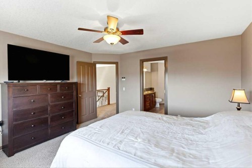 23 Aspen Stone Crescent Sw, Calgary, AB - Indoor Photo Showing Bedroom