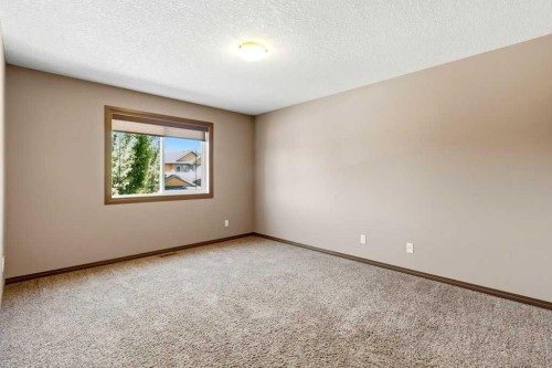 23 Aspen Stone Crescent Sw, Calgary, AB - Indoor Photo Showing Other Room
