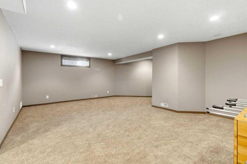 23 Aspen Stone Crescent Sw, Calgary, AB - Indoor Photo Showing Basement