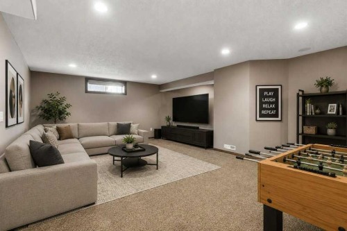 23 Aspen Stone Crescent Sw, Calgary, AB - Indoor Photo Showing Basement