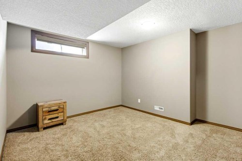 23 Aspen Stone Crescent Sw, Calgary, AB - Indoor Photo Showing Other Room