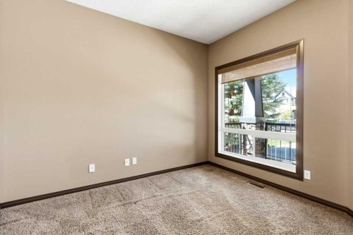 23 Aspen Stone Crescent Sw, Calgary, AB - Indoor Photo Showing Other Room