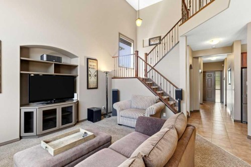 23 Aspen Stone Crescent Sw, Calgary, AB - Indoor Photo Showing Living Room