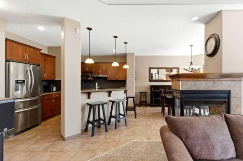 23 Aspen Stone Crescent Sw, Calgary, AB - Indoor With Fireplace