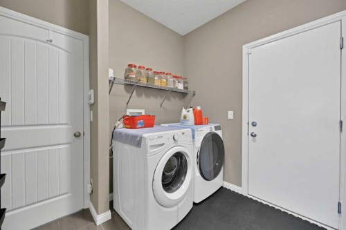 128 Nolanlake View North, Calgary, AB - Indoor Photo Showing Laundry Room