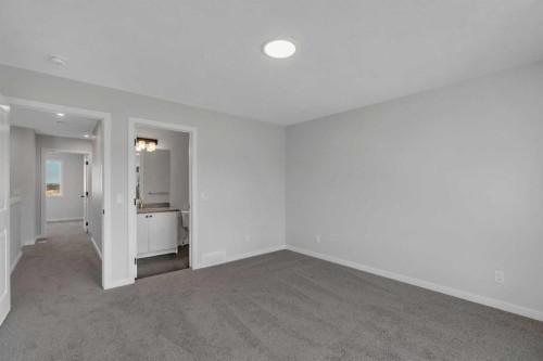229 Heirloom Way Se, Calgary, AB - Indoor Photo Showing Other Room
