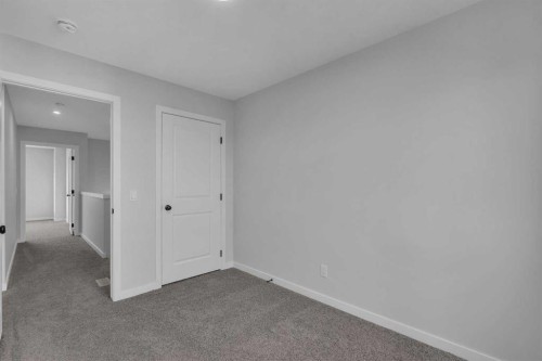229 Heirloom Way Se, Calgary, AB - Indoor Photo Showing Other Room