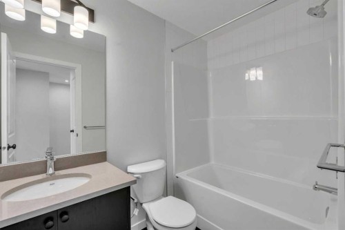 229 Heirloom Way Se, Calgary, AB - Indoor Photo Showing Bathroom