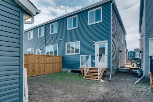 229 Heirloom Way Se, Calgary, AB - Outdoor With Exterior