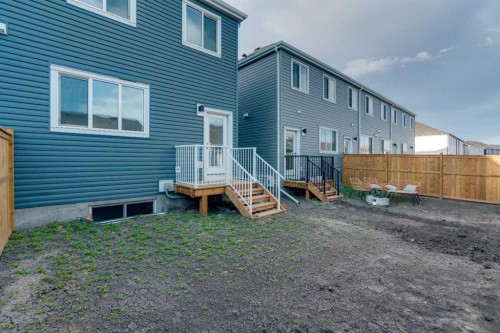 229 Heirloom Way Se, Calgary, AB - Outdoor With Exterior