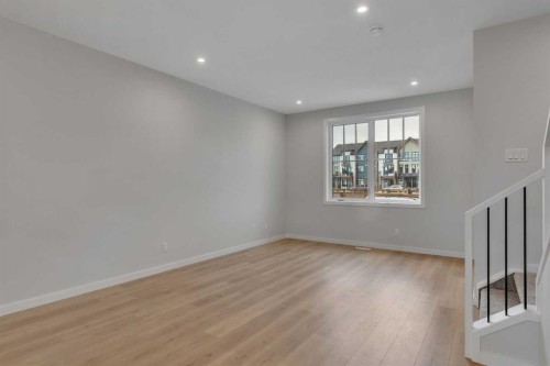 229 Heirloom Way Se, Calgary, AB - Indoor Photo Showing Other Room