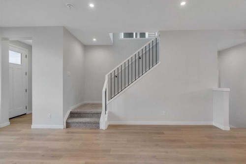229 Heirloom Way Se, Calgary, AB - Indoor Photo Showing Other Room