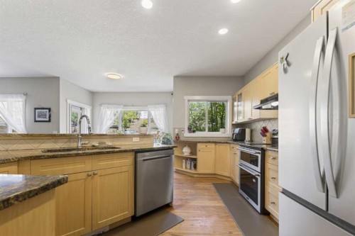 122 Discovery Ridge Way Sw, Calgary, AB - Indoor Photo Showing Kitchen With Double Sink