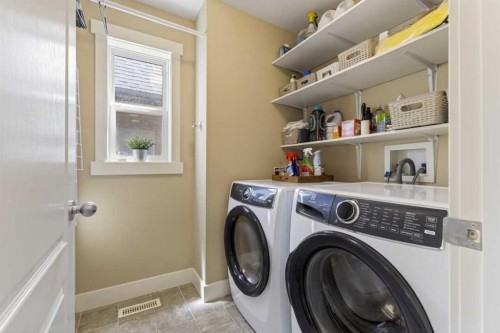 122 Discovery Ridge Way Sw, Calgary, AB - Indoor Photo Showing Laundry Room