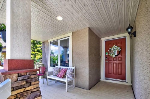122 Discovery Ridge Way Sw, Calgary, AB - Outdoor With Deck Patio Veranda With Exterior