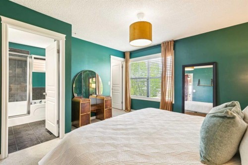 1807 New Brighton Drive Se, Calgary, AB - Indoor Photo Showing Bedroom