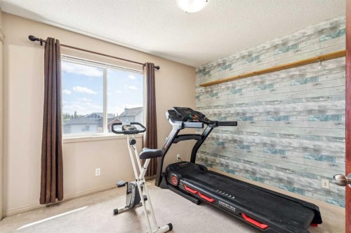 1807 New Brighton Drive Se, Calgary, AB - Indoor Photo Showing Gym Room