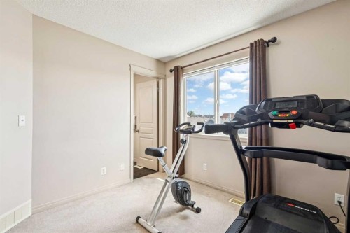 1807 New Brighton Drive Se, Calgary, AB - Indoor Photo Showing Gym Room