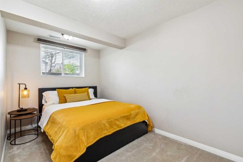 1807 New Brighton Drive Se, Calgary, AB - Indoor Photo Showing Bedroom