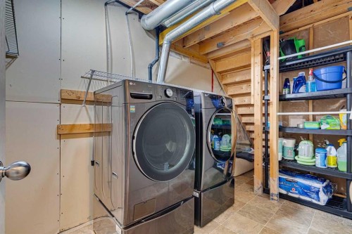 1807 New Brighton Drive Se, Calgary, AB - Indoor Photo Showing Laundry Room