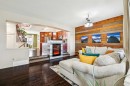 1807 New Brighton Drive Se, Calgary, AB  - Indoor Photo Showing Living Room With Fireplace 