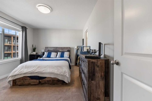 258 Canals Crossing Sw, Airdrie, AB - Indoor Photo Showing Bedroom