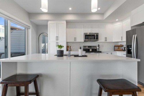 258 Canals Crossing Sw, Airdrie, AB - Indoor Photo Showing Kitchen With Upgraded Kitchen