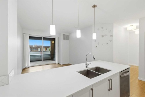 212-122 Mahogany Centre Se, Calgary, AB - Indoor Photo Showing Kitchen With Double Sink
