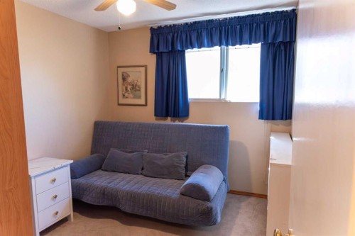 164 Huntford Road Ne, Calgary, AB - Indoor Photo Showing Bedroom