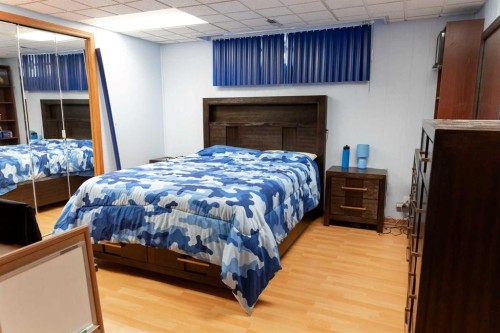 164 Huntford Road Ne, Calgary, AB - Indoor Photo Showing Bedroom