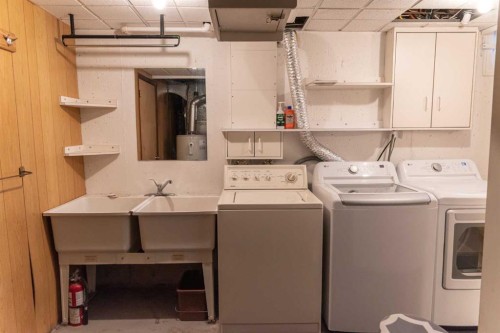 164 Huntford Road Ne, Calgary, AB - Indoor Photo Showing Laundry Room