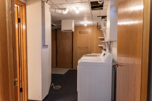 164 Huntford Road Ne, Calgary, AB - Indoor Photo Showing Laundry Room