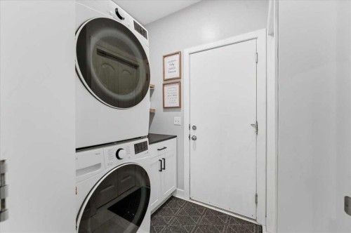 17 Bridlecrest Court Sw, Calgary, AB - Indoor Photo Showing Laundry Room