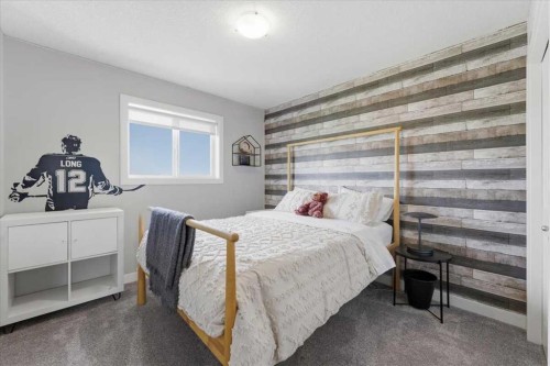 17 Bridlecrest Court Sw, Calgary, AB - Indoor Photo Showing Bedroom