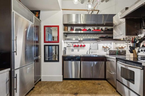 102D-500 Eau Claire Avenue Sw, Calgary, AB - Indoor Photo Showing Kitchen With Stainless Steel Kitchen
