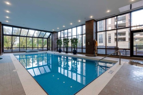 102D-500 Eau Claire Avenue Sw, Calgary, AB - Indoor Photo Showing Other Room With In Ground Pool