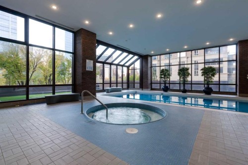 102D-500 Eau Claire Avenue Sw, Calgary, AB - Indoor Photo Showing Other Room With In Ground Pool