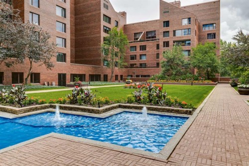 102D-500 Eau Claire Avenue Sw, Calgary, AB - Outdoor With In Ground Pool