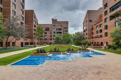 102D-500 Eau Claire Avenue Sw, Calgary, AB - Outdoor With In Ground Pool