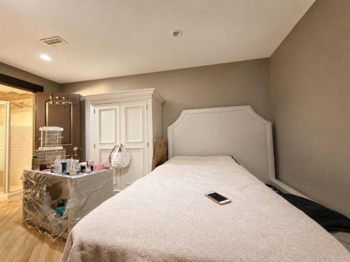 288 Rainbow Falls Drive, Chestermere, AB - Indoor Photo Showing Bedroom
