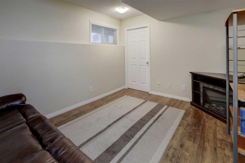 158 Everhollow Heights Sw, Calgary, AB - Indoor With Fireplace