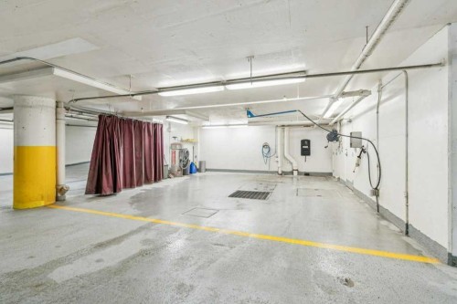 303-837 2 Avenue Sw, Calgary, AB - Indoor Photo Showing Garage