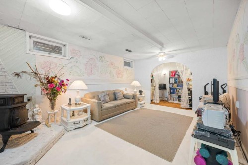 41 Castleglen Road Ne, Calgary, AB - Indoor With Fireplace