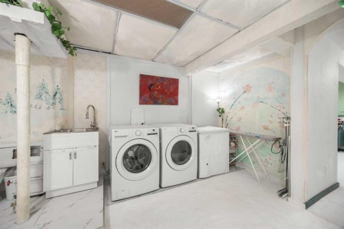 41 Castleglen Road Ne, Calgary, AB - Indoor Photo Showing Laundry Room