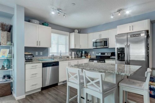 2114-755 Copperpond Boulevard Se, Calgary, AB - Indoor Photo Showing Kitchen With Stainless Steel Kitchen With Upgraded Kitchen