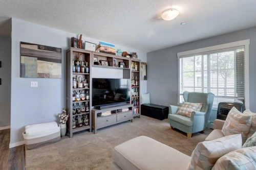 2114-755 Copperpond Boulevard Se, Calgary, AB - Indoor Photo Showing Living Room