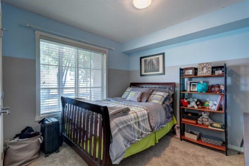 2114-755 Copperpond Boulevard Se, Calgary, AB - Indoor Photo Showing Bedroom