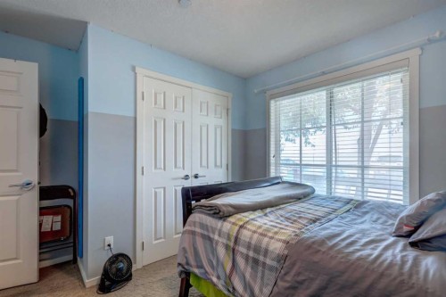 2114-755 Copperpond Boulevard Se, Calgary, AB - Indoor Photo Showing Bedroom