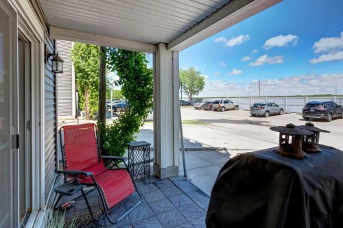 2114-755 Copperpond Boulevard Se, Calgary, AB - Outdoor With Deck Patio Veranda With Exterior